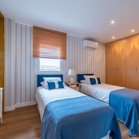 Atico Cholas By The *