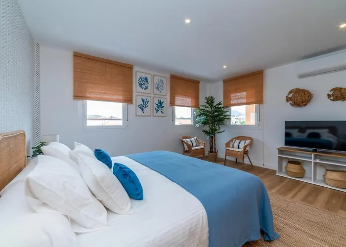 Atico Cholas By The *