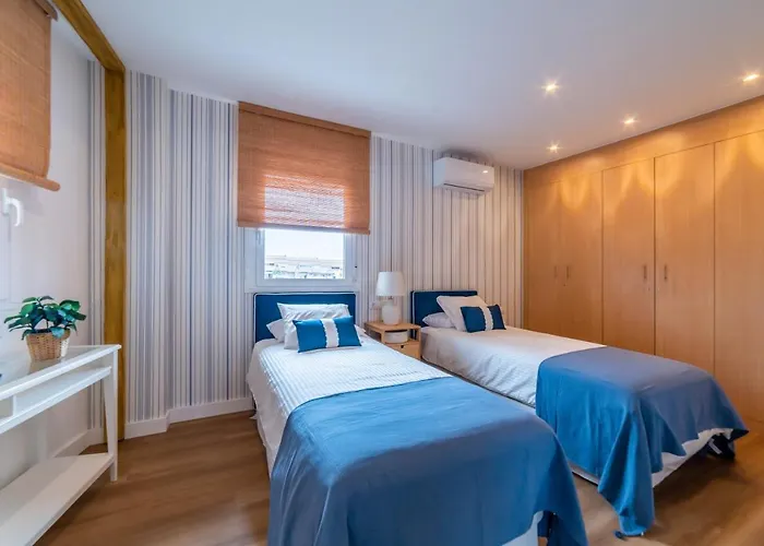 Atico Cholas By The *